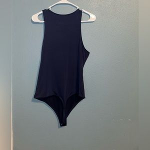 Express body contour body suit .